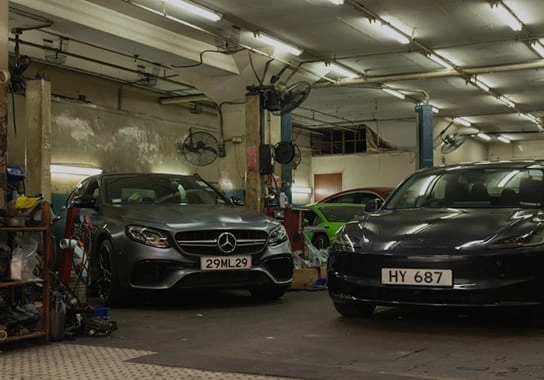 Cars inside a professional detailing studio