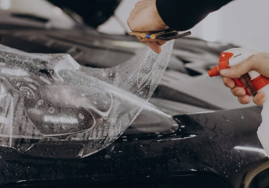 Ceramic coating being applied during vehicle protection